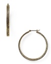 Glamor defined: subtle texture gives these gold-plated hoop earrings from Lauren Ralph Lauren added dimension. Wear them to take your look from simple to striking.