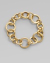 From the Jaipur Links Collection. A modern version of a classic link bracelet, formed of varied circular links of brushed 18k gold.18k yellow gold Length, about 8½ Hidden spring clip clasp Made in Italy