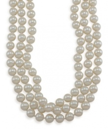 Wrap up your overall look with a last minute touch. This long, rope necklace by Carolee features shimmery white glass pearls (10 mm) set in mixed metal. Approximate length: 72 inches. Wrap up your overall look with a last minute touch. This long, rope necklace by Carolee features shimmery white glass pearls (10 mm) set in mixed metal. Approximate length: 72 inches.