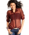 Go edgy in Eyeshadow's killer update to the classic plaid button-down! Sports sheer design and a super-hot lace back.