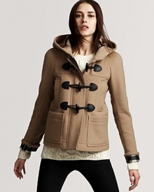 A sumptuous hood and short length lend a casual feel to this Burberry Brit jacket. Layer over luxe sweaters for chic, everyday wear.