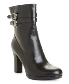 Do a double take: A duo of straps host buckle hardware embellishment on Bandolino's stylish Nanina leather platform ankle boots. With a round-toe shape, zipper closure and covered heel, they're available in black, brown and gray. Do a double take: A duo of straps host buckle hardware embellishment on Bandolino's stylish Nanina leather platform ankle boots. With a round-toe shape, zipper closure and covered heel, they're available in black, brown and gray.