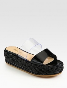 Artfully braided leather platform and a clear PVC strap modernize this patent leather slide. Braided leather platform, 2 (50mm)Patent leather and clear PVC upperLeather liningRubber solePadded insoleMade in Italy Artfully braided leather platform and a clear PVC strap modernize this patent leather slide. Braided leather platform, 2 (50mm)Patent leather and clear PVC upperLeather liningRubber solePadded insoleMade in Italy