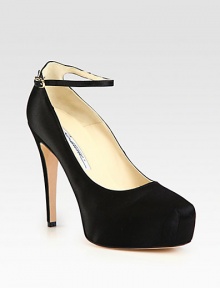 Signature silhouette impeccably-crafted of rich satin, finished with a high heel and thin ankle strap. Self-covered heel, 5 (125mm)Hidden platform, 1¼ (30mm)Compares to a 3¾ heel (95mm)Satin upperAdjustable ankle strapLeather lining and solePadded insoleMade in ItalyOUR FIT MODEL RECOMMENDS ordering one half size up as this style runs small. Signature silhouette impeccably-crafted of rich satin, finished with a high heel and thin ankle strap. Self-covered heel, 5 (125mm)Hidden platform, 1¼ (30mm)Compares to a 3¾ heel (95mm)Satin upperAdjustable ankle strapLeather lining and solePadded insoleMade in ItalyOUR FIT MODEL RECOMMENDS ordering one half size up as this style runs small.