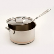 Designed for searing and quickly cooking foods, this pan may also be used to prepare risotto and paella, create vegetable dishes and more. Offering deeper capacity than a frying pan, it has a long handle for moving quickly back and forth over the burner when searing and sautéing, and a helper handle that makes carrying and emptying easy. The thick anodized aluminum exterior wont scratch or chip, cleans up effortlessly and provides superior heat conduction. The cooking surface is 18/10 stainless steel, with an aluminum core extending all the way up the sides of each piece. Stay-cool cast stainless steel handles are riveted on for a lifetime of beauty and durability. Designed for searing and quickly cooking foods, this pan may also be used to prepare risotto and paella, create vegetable dishes and more. Offering deeper capacity than a frying pan, it has a long handle for moving quickly back and forth over the burner when searing and sautéing, and a helper handle that makes carrying and emptying easy. The thick anodized aluminum exterior wont scratch or chip, cleans up effortlessly and provides superior heat conduction. The cooking surface is 18/10 stainless steel, with an aluminum core extending all the way up the sides of each piece. Stay-cool cast stainless steel handles are riveted on for a lifetime of beauty and durability.