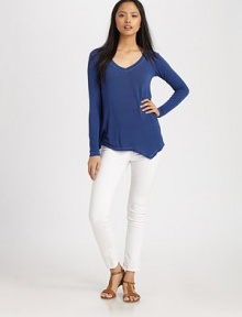 An easy-to-wear shirt of soft-stretch fabric in a modern asymmetrical silhouette. Deep v-neckDropped shouldersLong sleevesAsymmetrical hemViscoseMachine washMade in USAModel shown is 5'11 (178cm) wearing US size Small. An easy-to-wear shirt of soft-stretch fabric in a modern asymmetrical silhouette. Deep v-neckDropped shouldersLong sleevesAsymmetrical hemViscoseMachine washMade in USAModel shown is 5'11 (178cm) wearing US size Small.