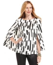 The silhouette of the season -- the cape -- makes for a truly special blouse from Nine West. Perfect for partnering with slim silhouettes like a pencil skirt or skinny pants. The silhouette of the season -- the cape -- makes for a truly special blouse from Nine West. Perfect for partnering with slim silhouettes like a pencil skirt or skinny pants.