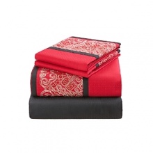 Josie Natori once again brings Eastern art to Western life with Geisha. A profusion of Geisha Red contrasting against Natori Black evokes a feeling of rich mystery. The his and her Geisha and Samurai Euros feature hints of pearly shoulders and necks, contrasted with jet-black chignons and red kimono accents. Embroidery on the Euros is of fine silky yarn on a dramatically contrasting ground of Khaki cotton. Further evoking Eastern art in the form of a samurai sword, the obi quilting pattern uses golden threads on the Geisha Red coverlet which creates a modern geometric texture with an embroidered border. Josie Natori once again brings Eastern art to Western life with Geisha. A profusion of Geisha Red contrasting against Natori Black evokes a feeling of rich mystery. The his and her Geisha and Samurai Euros feature hints of pearly shoulders and necks, contrasted with jet-black chignons and red kimono accents. Embroidery on the Euros is of fine silky yarn on a dramatically contrasting ground of Khaki cotton. Further evoking Eastern art in the form of a samurai sword, the obi quilting pattern uses golden threads on the Geisha Red coverlet which creates a modern geometric texture with an embroidered border.