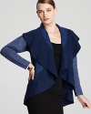 Geometric color blocking accentuates the ruffled silhouette of this Eileen Fisher cardigan for a modern style statement.