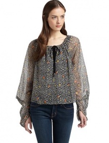 THE LOOKFloral and leaf printSemi-sheer designMetallic accentsDrawstring neckline with contrast tieContrasting keyhole detailLong sleeves with modified gathered effectTHE FITAbout 21 from shoulder to hemTHE MATERIALNylon/polyesterCARE & ORIGINHand washMade in USAModel shown is 5'9 (175cm) wearing US size Small. THE LOOKFloral and leaf printSemi-sheer designMetallic accentsDrawstring neckline with contrast tieContrasting keyhole detailLong sleeves with modified gathered effectTHE FITAbout 21 from shoulder to hemTHE MATERIALNylon/polyesterCARE & ORIGINHand washMade in USAModel shown is 5'9 (175cm) wearing US size Small.