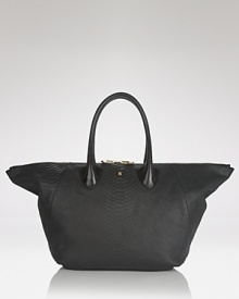 This embossed leather bag from Pour La Victoire takes the tote to exotic extremes. Whether you're carrying on or simply in need of a cool carryall, this sizable style is wildly chic.