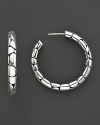 From the Kali collection, medium hoop earrings with the molten lava motif, designed by John Hardy.