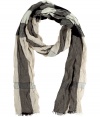 Luxurious scarf made ​.​.of fine cashmere - In a checked look with stitching framing the checks, in warm shades of charcoal grey - The material is soft, lightly stitched and crinkled - With trendy pin fringing on all sides - Keeps you warm AND is a trendy accessory - Suitable for many styles, such as shirts, parkas, blazers, winter coats