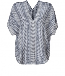 Work a worldly print into your effortless cool looks with Vinces featherweight Aztec print silk tunic - V-neckline in front and back, dolman short sleeves, longer back - Oversized silhouette - Wear with slim-fitting separates and bright leather sandals Work a worldly print into your effortless cool looks with Vinces featherweight Aztec print silk tunic - V-neckline in front and back, dolman short sleeves, longer back - Oversized silhouette - Wear with slim-fitting separates and bright leather sandals
