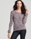 This chic Theory sweater, rendered in a mix of dreamy lilac and cream, flaunts the season's hand-knit trend. Featuring an unfinished neckline and cable knit at one arm, the style instantly upgrades weekend basics with asymmetric cool.