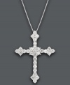 Spiritual by design. This dazzling diamond (1-1/2 ct. t.w.) cross pendant features intricate floral-shaped edges set in 14k white gold. Approximate length: 18 inches. Approximate drop: 1-1/4 inches.