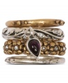 Stack up with pretty florals. Lucky Brand's stack ring features floral details and plastic accents. Crafted in gold and silver tone mixed metal. Size 7.