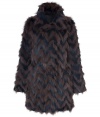 Take a show-stopping stance on chic winter style in Antik Batiks two-tone fur coat, detailed in dramatic contrasting rabbit and fox for ultra luxurious results guaranteed to make an impact - Spread collar, long sleeves, hidden front hook closures, side slit pockets - Contemporary straight fit, hits at the knee - Pair with form-fitting separates and edgy statement accessories