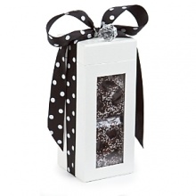 Nicely wrapped in a beautiful box and polka dot black bow, these chocolate-covered confections are a mouthwatering delight - perfect for gift giving. Nicely wrapped in a beautiful box and polka dot black bow, these chocolate-covered confections are a mouthwatering delight - perfect for gift giving.