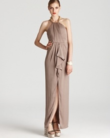 Golden chainlink details lend a luxe look to BCBGMAXAZRIA's long and lean dress--team with chunky bangles for a look that's going places. Golden chainlink details lend a luxe look to BCBGMAXAZRIA's long and lean dress--team with chunky bangles for a look that's going places.