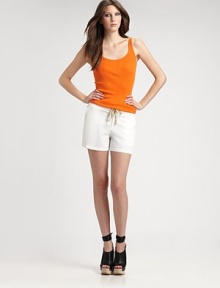 Pima cotton and modal-blend scoopneck with allover ribbing and an enticing scoopback. ScoopneckSleevelessScoopbackLonger length hits below the hips50% pima cotton/50% modalMachine washImportedModel shown is 5'10 (177cm) wearing US size 4. Pima cotton and modal-blend scoopneck with allover ribbing and an enticing scoopback. ScoopneckSleevelessScoopbackLonger length hits below the hips50% pima cotton/50% modalMachine washImportedModel shown is 5'10 (177cm) wearing US size 4.