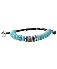 Wrap your wrist in blue hues. The colorful reconstituted turquoise stones on this Fossil bracelet are accented by clear crystal pave. An adjustable chocolate brown leather cord holds it all together. Set in silver tone mixed metal. Approximate diameter: 2-1/2 inches. Wrap your wrist in blue hues. The colorful reconstituted turquoise stones on this Fossil bracelet are accented by clear crystal pave. An adjustable chocolate brown leather cord holds it all together. Set in silver tone mixed metal. Approximate diameter: 2-1/2 inches.