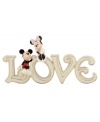 True love found. Minnie and Mickey Mouse share a special moment in this gold-banded porcelain figurine from Lenox. A sweet gift for your favorite Disney fan.