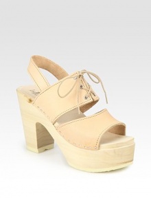 Wide leather straps with a lace-up front, secure slingback and natural wooden heel. Wooden heel, 4 (100mm)Wooden platform, 1½ (40mm)Compares to a 2½ heel (65mm)Leather upperLeather liningFoam soleImported Wide leather straps with a lace-up front, secure slingback and natural wooden heel. Wooden heel, 4 (100mm)Wooden platform, 1½ (40mm)Compares to a 2½ heel (65mm)Leather upperLeather liningFoam soleImported