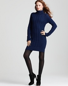 Show off your stems in this BCBGMAXAZRIA cabled sweater mini dress with semi sheer tights and soaring booties. Show off your stems in this BCBGMAXAZRIA cabled sweater mini dress with semi sheer tights and soaring booties.