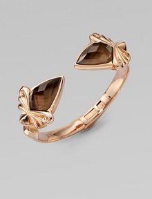 From the Superstud Collection. An arresting baroque design in sterling silver layered with glowing rose goldplating, capped with faceted triangles of smokey quartz quartz layered over white mother-of-pearl creating depth and drama.Smokey quartz and white mother-of-pearlRose goldplated sterling silverDiameter, about 2½HingedImported From the Superstud Collection. An arresting baroque design in sterling silver layered with glowing rose goldplating, capped with faceted triangles of smokey quartz quartz layered over white mother-of-pearl creating depth and drama.Smokey quartz and white mother-of-pearlRose goldplated sterling silverDiameter, about 2½HingedImported