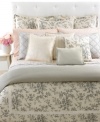 A detailed toile print of cherry blossoms and branches cascades over a sumptuous cream ground in the Saint Honore duvet cover. Streamlined piping and a frame of grosgrain ribbon finishes this traditional look with a touch of modern romance. Reverses to a subtle houndstooth print for an impressive transformation in style.