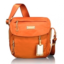 Book your ticket and travel in style with this refined messenger bag, an essential component of the Voyageur collection. Book your ticket and travel in style with this refined messenger bag, an essential component of the Voyageur collection.