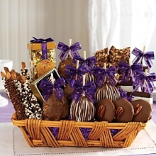 An incredible collection of gourmet treats. Includes 3 Triple Chocolate Petite Apples, 3 Milk Chocolate Walnut Petite Apples, 3 Triple Chocolate Chip Pretzels, 3 Milk Chocolate Crunch Pretzels, 3 Peanut Butter and Milk Chocolate Chip Pretzels, 3 Triple Chocolate Caramel Favors, 3 Milk Chocolate Pecan Nut Clusters, 4-Piece Caramel Truffle Sampler, 16 ounces of Milk Chocolate Almond Bark and a 14 oz. Classic Vanilla Caramel Gift Tube. An incredible collection of gourmet treats. Includes 3 Triple Chocolate Petite Apples, 3 Milk Chocolate Walnut Petite Apples, 3 Triple Chocolate Chip Pretzels, 3 Milk Chocolate Crunch Pretzels, 3 Peanut Butter and Milk Chocolate Chip Pretzels, 3 Triple Chocolate Caramel Favors, 3 Milk Chocolate Pecan Nut Clusters, 4-Piece Caramel Truffle Sampler, 16 ounces of Milk Chocolate Almond Bark and a 14 oz. Classic Vanilla Caramel Gift Tube.
