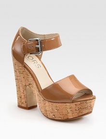 Natural cork heel and platform uplift a supple patent leather upper with an adjustable ankle strap. Cork heel, 5 (125mm)Cork platform, 1½ (40mm)Compares to a 3½ heel (90mm)Patent leather upperLeather lining and solePadded insoleImported Natural cork heel and platform uplift a supple patent leather upper with an adjustable ankle strap. Cork heel, 5 (125mm)Cork platform, 1½ (40mm)Compares to a 3½ heel (90mm)Patent leather upperLeather lining and solePadded insoleImported