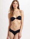 A new twist on the classic bikini, this bandeau design features feminine, twisted details and a removable halter strap for additional support. Twist-front bandeau topBack tie closureRemovable halter strapStretch bottomTwist-front waistbandFully lined86% polyamide/14% elastaneHand washImported