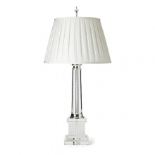 Elegant in its architectural design, this table lamp with polished silver atop a crystal base lights up any room. Elegant in its architectural design, this table lamp with polished silver atop a crystal base lights up any room.