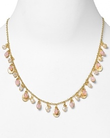 Lauren by Ralph Lauren gives your neckline the Midas treatment with this worn gold tone and pearl necklace. Ever sophisticated, this piece gleams beneath a crisp blouse. Lauren by Ralph Lauren gives your neckline the Midas treatment with this worn gold tone and pearl necklace. Ever sophisticated, this piece gleams beneath a crisp blouse.