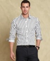 Line up your fall shirting style with this slim fit vertical striped shirt from Tommy Hilfiger.