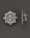 Intricately wrought sterling silver leaves form elegant earrings. By Buccellati.