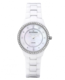 Impeccable design to keep impeccable time. Watch by Skagen Denmark crafted of white ceramic bracelet and round case. Bezel crystallized with Swarovski elements. Mother-of-pearl dial features silver tone numerals at twelve and six o'clock, crystal accents at markers, three silver tone hands and black logo. Quartz movement. Water resistant to 30 meters. Limited lifetime warranty. Impeccable design to keep impeccable time. Watch by Skagen Denmark crafted of white ceramic bracelet and round case. Bezel crystallized with Swarovski elements. Mother-of-pearl dial features silver tone numerals at twelve and six o'clock, crystal accents at markers, three silver tone hands and black logo. Quartz movement. Water resistant to 30 meters. Limited lifetime warranty.