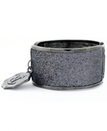 Stylish and sparkling! A glamorous glitter finish sets apart this chic cuff bracelet from Vince Camuto--wear it day or night to dress up your style. Featuring a signature logo charm and hinge closure, it's crafted in hematite tone mixed metal. Approximate diameter: 1/2 inch. Stylish and sparkling! A glamorous glitter finish sets apart this chic cuff bracelet from Vince Camuto--wear it day or night to dress up your style. Featuring a signature logo charm and hinge closure, it's crafted in hematite tone mixed metal. Approximate diameter: 1/2 inch.