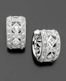 Beautiful huggie earrings with gleaming crystal accents convey timeless elegance. Rhodium plated. Diameter measures 1/2 inch. Beautiful huggie earrings with gleaming crystal accents convey timeless elegance. Rhodium plated. Diameter measures 1/2 inch.