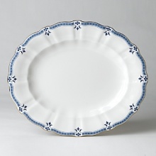 Though Grenville's geometric shapes and studs, set in a narrow border, lend the pattern a modern feel, the stylish leaf and flower elements closely follow classic Derby tradition. Though Grenville's geometric shapes and studs, set in a narrow border, lend the pattern a modern feel, the stylish leaf and flower elements closely follow classic Derby tradition.