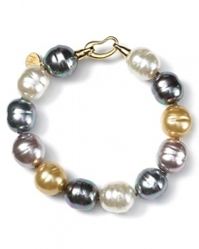 This multi pearl bracelet makes a bold, stylish statement and will finish your look in polished perfection. This multi pearl bracelet makes a bold, stylish statement and will finish your look in polished perfection.