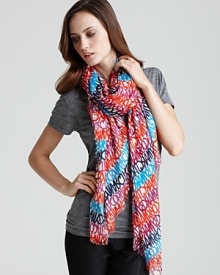 A playful logo and vibrant colors decorate this long soft scarf from MARC BY MARC JACOBS. A playful logo and vibrant colors decorate this long soft scarf from MARC BY MARC JACOBS.