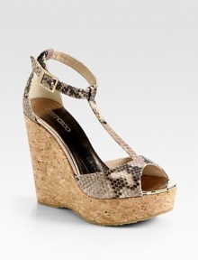 Style meets comfort in this luxe snake-print leather design, resting on a powerful cork wedge. Cork wedge, 5 (125mm)Cork platform, 1½ (40mm)Compares to a 3½ heel (90mm)Snake-print leather upperAdjustable ankle strapMetallic leather liningRubber solePadded insoleMade in Spain Style meets comfort in this luxe snake-print leather design, resting on a powerful cork wedge. Cork wedge, 5 (125mm)Cork platform, 1½ (40mm)Compares to a 3½ heel (90mm)Snake-print leather upperAdjustable ankle strapMetallic leather liningRubber solePadded insoleMade in Spain