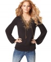 INC's peasant top pairs embroidery with a boho-chic lace-up front placket. Try it with hoop earrings to complete the look.