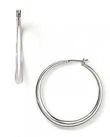 Graceful hoops earrings from Lauren by Ralph Lauren, simply crafted from polished silver plate. Graceful hoops earrings from Lauren by Ralph Lauren, simply crafted from polished silver plate.