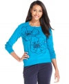 Get a romantic touch with Charter Club's basic cardigan, complete with an embroidered floral design at the front.