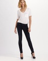 The perfect wash and fit, this skinny silhouette of stretch denim features light fading for a subtle worn-in feel.THE FITFitted through hips and thighsRise, about 7¼Inseam, about 33THE DETAILSZip flyFive-pocket style98% cotton/2% spandexMachine washMade in USA of imported fabricModel shown is 5'10 (177cm) wearing US size 4.